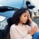 Black woman feeling pain after car crash
