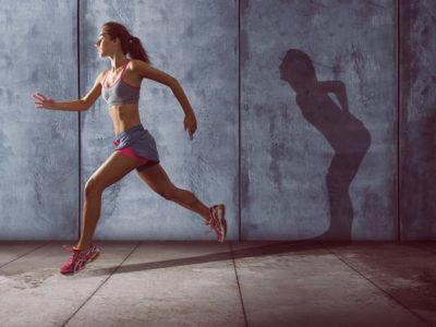 woman running after feeling back pain