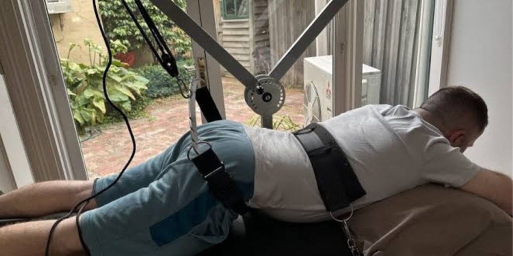 Patient recovering after spinal decompression therapy with guidance from a chiropractor | Post Spinal Decompression Therapy Recovery
