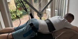 Patient recovering after spinal decompression therapy with guidance from a chiropractor | Post Spinal Decompression Therapy Recovery